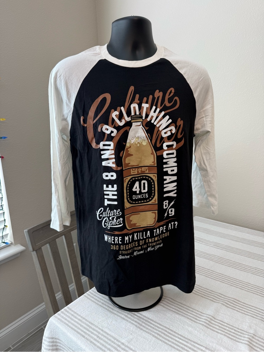 The 8 and 9 Clothing Company raglan three quarter-Sleeve Graphic Tee